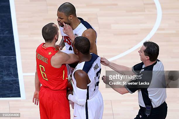 Tyson Chandler of the United States reacts after clashing with Sergio Rodriguez of Spain during the Men's Basketball gold medal game between the...