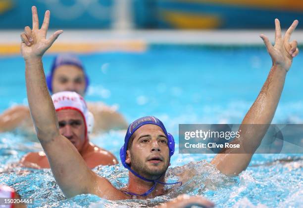 Vanja Udovicic of Serbia celebrates winning the bronze during the Men's Bronze Medal Match between Montenegro and Serbia on Day 16 of the London 2012...