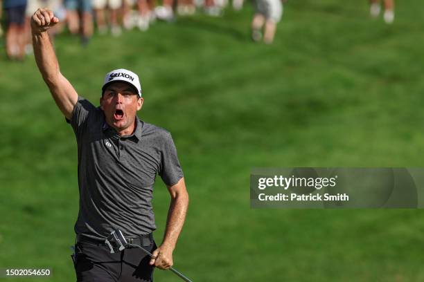 Keegan Bradley of the United States celebrates after winning on the 18th green during the final round of the Travelers Championship at TPC River...