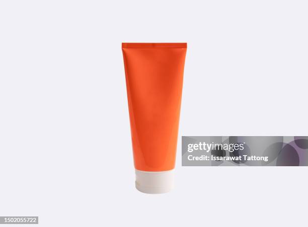 orange packaging mock-up tube for medicine or cosmetics - cream, gel, skin care, toothpaste. - creme tube ストックフォトと画像