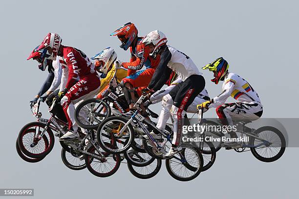 The field race across a jump in the Men's BMX Cycling Final on Day 14 of the London 2012 Olympic Games at the BMX Track on August 10, 2012 in London,...