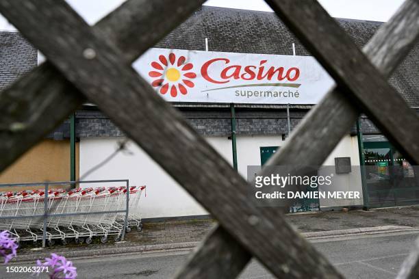 This photograph shows the logo of Casino in the entrance of a Casino shop in Ploubalay, western France on July 5, 2023. Their intentions were known,...