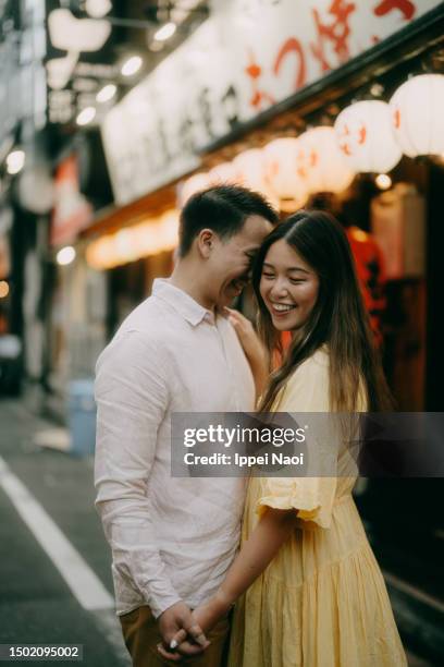 couple having romantic moment in tokyo - couple dancing stock pictures, royalty-free photos & images