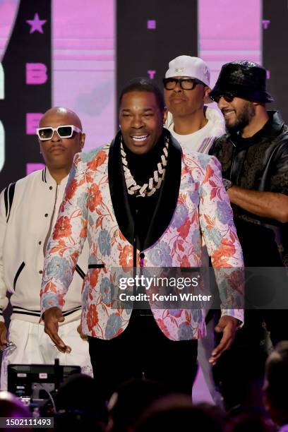 Busta Rhymes accepts the Lifetime Achievement Award from Spliff Star and Swizz Beatz onstage during the BET Awards 2023 at Microsoft Theater on June...