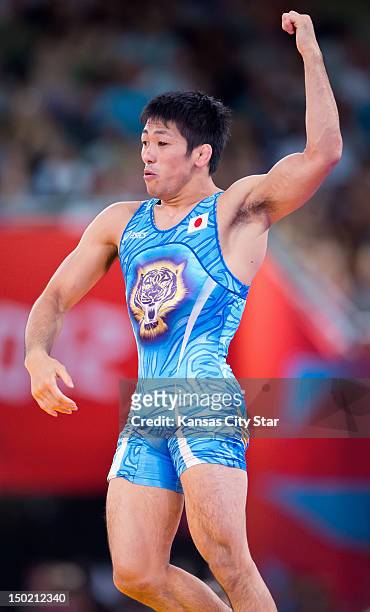 Tatsuhiro Yonemitsu of Japan celebrated at winning the gold medal by defeating Sushil Kumar of India in the gold medal match of the men's 96kg...