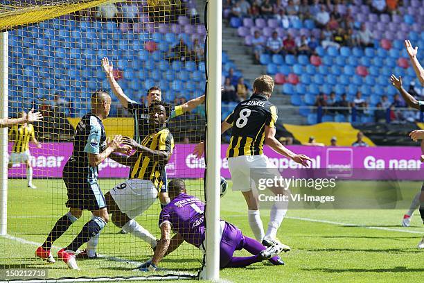 Tjaronn Chery of ADO Den Haag,Wilfried Bony of Vitesse,goalkeeper Gino Coutinho of ADO Den Haag,Marco van Ginkel of Vitesse during the Dutch...