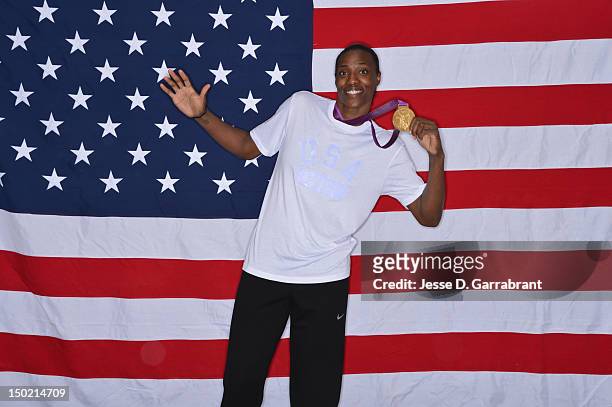 Sylvia Fowles of the US Women's Senior National Team poses for a portrait with her Gold Medal after defeating France in their Gold Medal Basketball...