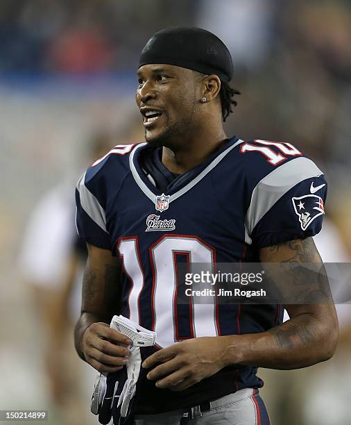 Jabar Gaffney of the New England Patriots watches the action from sidelines in a preseason game against the Orleans Saints in the first half at...