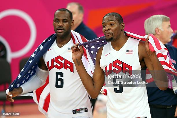 Team mates LeBron James of the United States and Kevin Durant of the United States celebrate winning the Men's Basketball gold medal game between the...