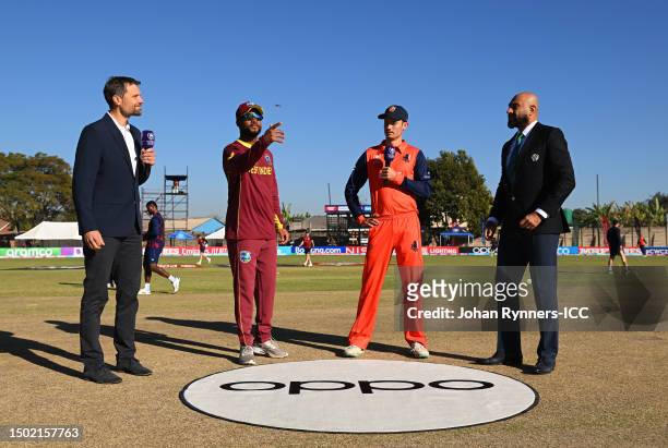 Shai Hope of West Indies and Scott Edwards of Netherlands take part in the coin toss prior to the ICC Men's Cricket World Cup Qualifier Zimbabwe 2023...