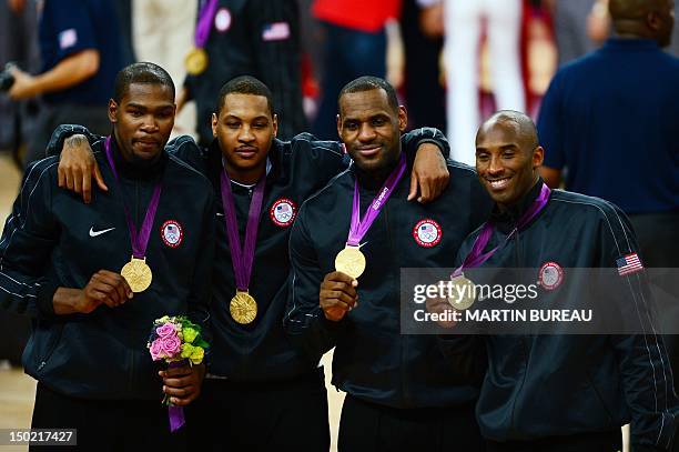 Gold medalists Kevin Durant, James Harden, LeBron James and Kobe Bryant pose on the podium after winning the London 2012 Olympic Games men's gold...