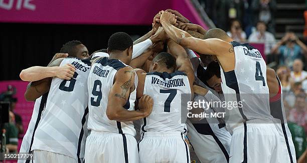 The USA team celebrates their victory over Spain in the Gold Medal game at the at the North Greenwich Arena during the 2012 Summer Olympic Games in...