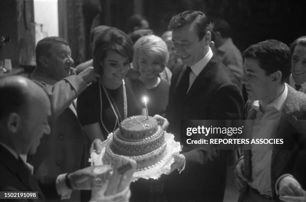 February: Actors Robert Dalban, Pascale Roberts, Yves Montand and Philippe Nicaud at Pierre Mondy's birthday at Theatre de la Renaissance, February...