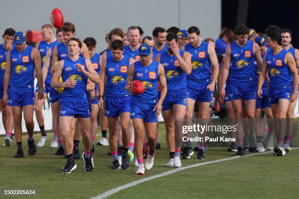 Players prepare to jog laps during a West Coast Eagles AFL training session at Mineral Resources Park on June 26, 2023 in Perth, Australia.