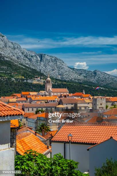 orange coloured terracota tiled roofs in korcula, adriatic coastline town, croatia - korcula island stock pictures, royalty-free photos & images