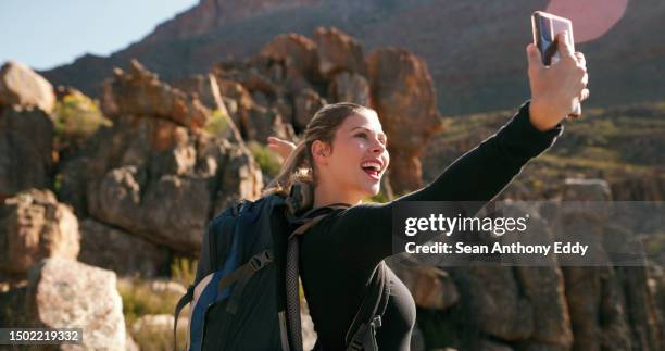 mountain, hike and woman with a smile, selfie and fitness with memory, health and natural. female person, hiker and lady with social media, excited and hiking with happiness, nature and workout goal - anthony summers stock pictures, royalty-free photos & images