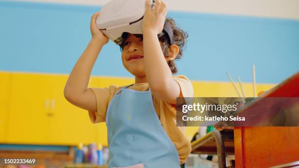 boy child, vr glasses and classroom with smile, excited and learning art in metaverse, 3d video and studying. young male kid, augmented reality and education with cyber gaming, creativity and school - school boy art stock pictures, royalty-free photos & images