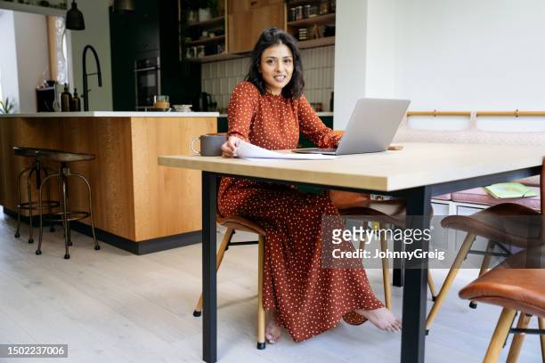 relaxed indian businesswoman working at home - interface dots stock pictures, royalty-free photos & images