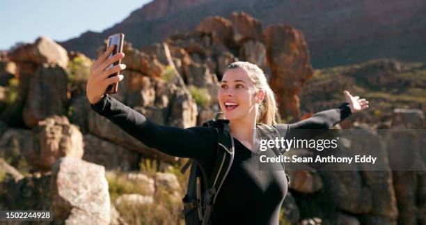 mountain, hiking and woman excited, selfie and exercise with memory, wellness or happiness. female person, hiker or girl with social media, training or fitness with workout goal, challenge or picture - anthony summers stock pictures, royalty-free photos & images