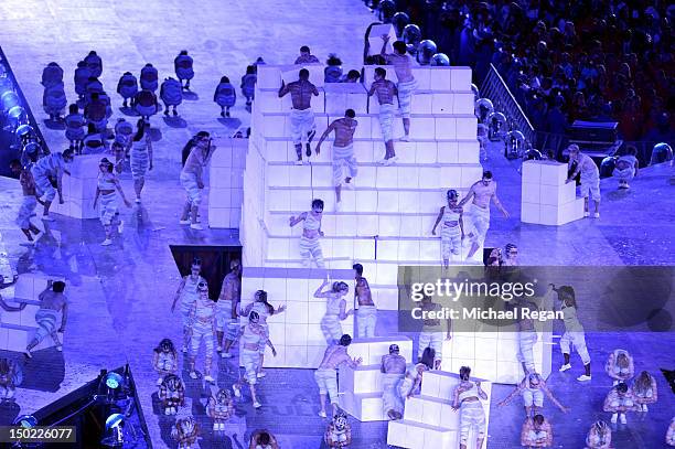 Dancers perform on the cube structure during the Closing Ceremony on Day 16 of the London 2012 Olympic Games at Olympic Stadium on August 12, 2012 in...