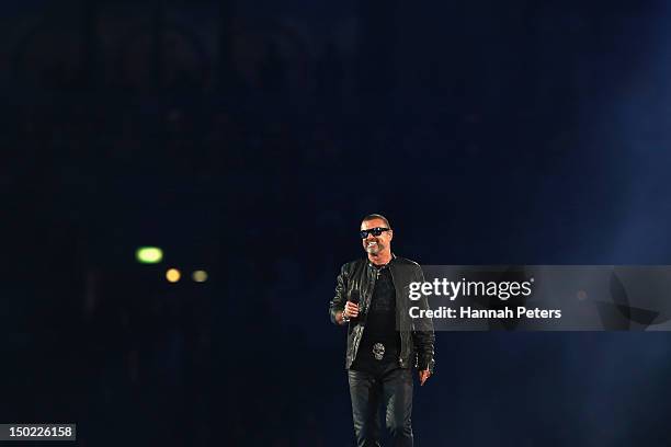 Singer George Michael performs during the Closing Ceremony on Day 16 of the London 2012 Olympic Games at Olympic Stadium on August 12, 2012 in...
