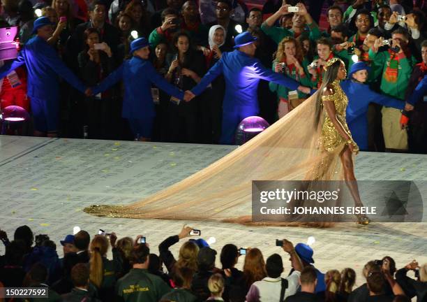 British model Naomi Campbell walks the catwalk during the closing ceremony of the London 2012 Olympic Games in the Olympic Stadium in east London on...