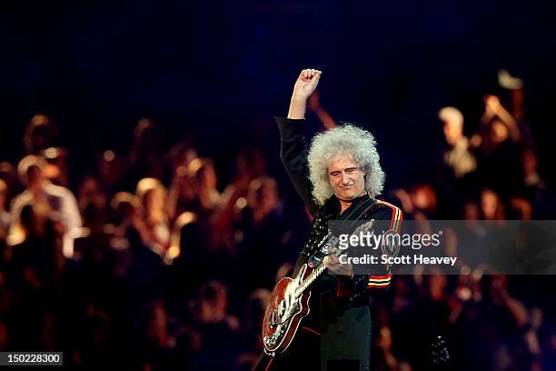 Brian May of Queen performs during the Closing Ceremony on Day 16 of the London 2012 Olympic Games at Olympic Stadium on August 12, 2012 in London,...