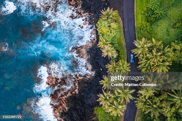 aerial view of road near the black volcanic coast - paysage volcanique photos et images de collection