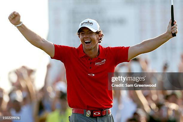 Rory McIlroy of Northern Ireland celebrates after putting on the 18th green during the Final Round of the 94th PGA Championship at the Ocean Course...