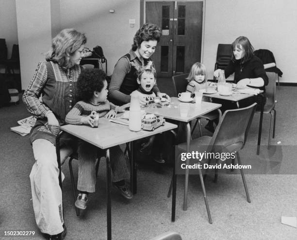 Student mothers Alida Haines and her son Jack, Pru Chamberlayne and her son Donovan, and Sue Tester and her daughter Rachel during the National Union...