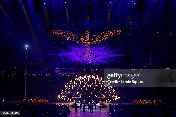 Phoenix is suspended over the Olympic Cauldron as it is extinguished during the Closing Ceremony on Day 16 of the London 2012 Olympic Games at...