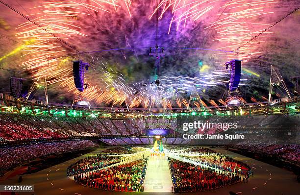 Fireworks explode over the stadium during the Closing Ceremony on Day 16 of the London 2012 Olympic Games at Olympic Stadium on August 12, 2012 in...