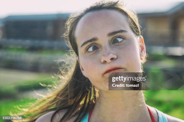 humorous young woman - funny face woman stock pictures, royalty-free photos & images