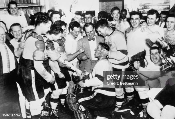 Scenes of jubilation in the locker room of the Detroit Red Wings after their Stanley Cup victory over the Montreal Canadiens in Detroit, April 17th...