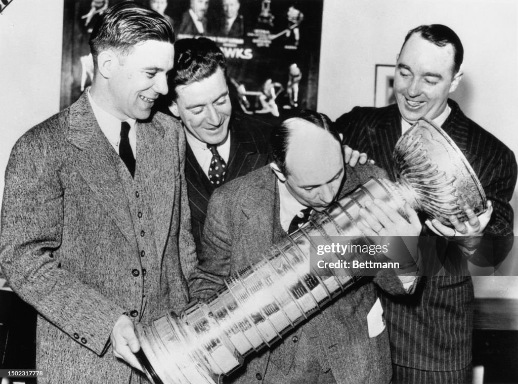 Chicago Black Hawks Manager Kissing Stanley Cup