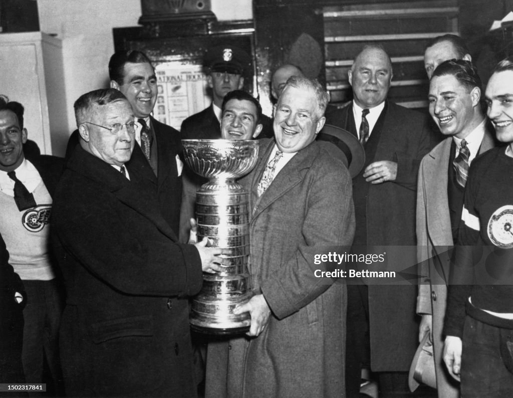 Frank Calder Presenting Stanley Cup To Jack Adams