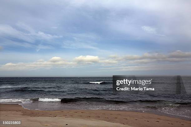 Waves break on Lighthouse Beach on Cape Cod on August 12, 2012 in Chatham, Massachusetts. A man was confirmed to have been bitten by a great white...