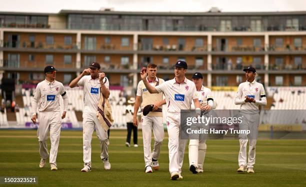 Matt Henry of Somerset leads their side off after taking six wickets during Day Two of the LV= Insurance County Championship Division 1 match between...