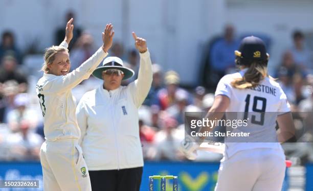 Australia bowler Ashleigh Gardner takes the wicket of Sophie Ecclestone as umpire Sue Redfern raises the finger during day five of the LV= Insurance...
