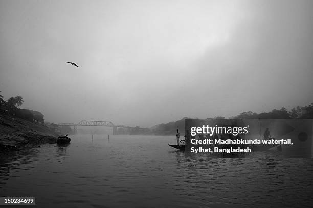 boat in river - madhabkunda stock pictures, royalty-free photos & images