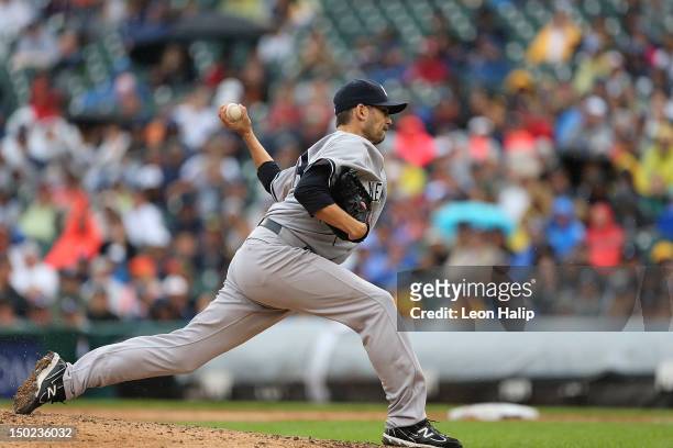 Clay Rapada of the New York Yankees pitches during the game against the Detroit Tigers at Comerica Park on August 9, 2012 in Detroit, Michigan. The...