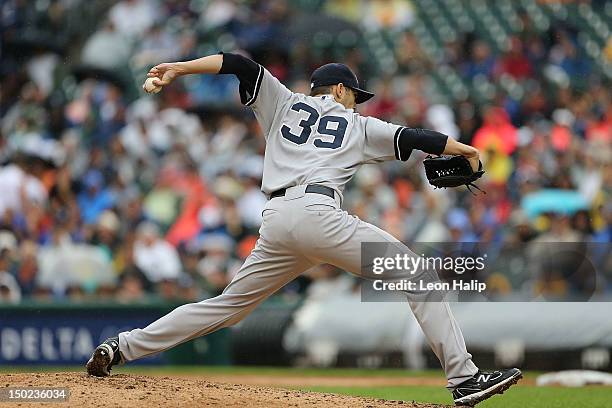 Clay Rapada of the New York Yankees pitches during the game against the Detroit Tigers at Comerica Park on August 9, 2012 in Detroit, Michigan. The...