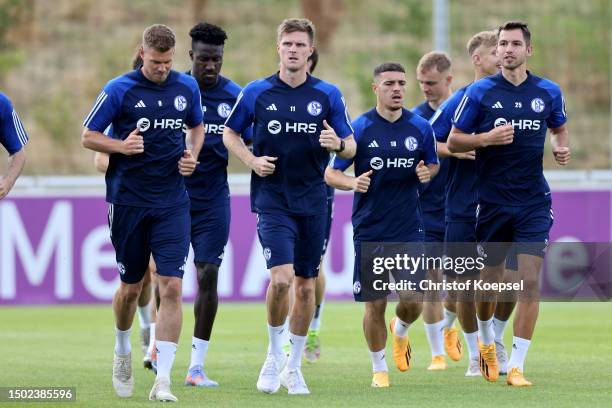 Simon Terodde and Marius Buelter attend a training session at Parkstadion on June 26, 2023 in Gelsenkirchen, Germany. FC Schalke 04 returned to...