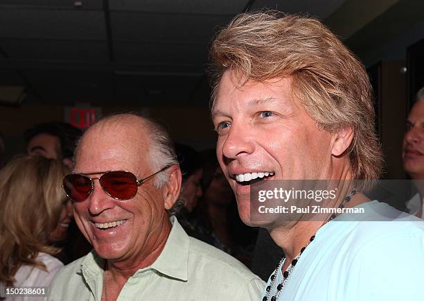 Jimmy Buffet and Jon Bon Jovi attend "Arbitrage" screening at UA East Hampton Theater on August 12, 2012 in East Hampton, New York.