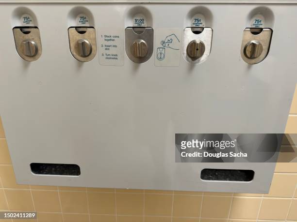 public bathroom vending machine for sexual needs - contraceptive patch foto e immagini stock