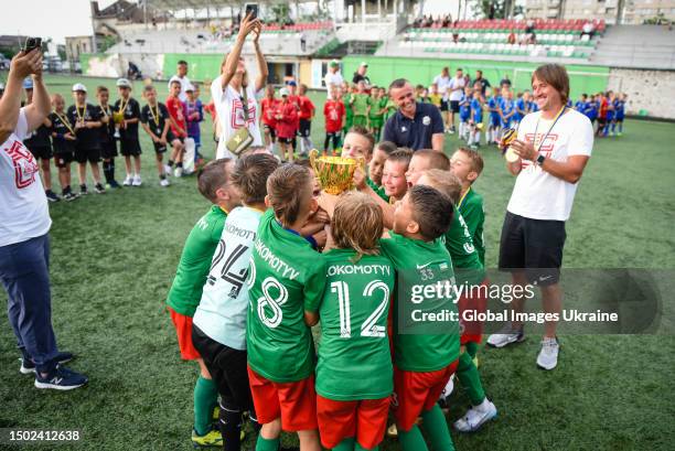 Lokomotyv Kyiv, the winners of the tournament “Irpin Cup”, holds the trophy and celebrates the first place on June 24, 2023 in Irpin, Ukraine. The...