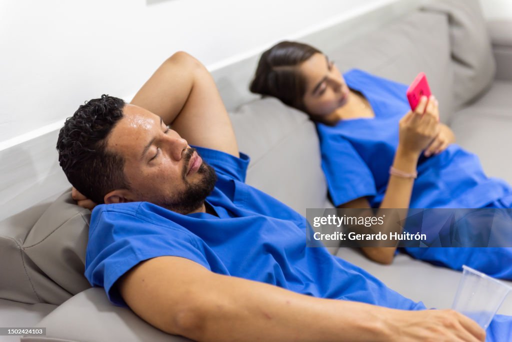 Nurses resting in a hospital rest area.