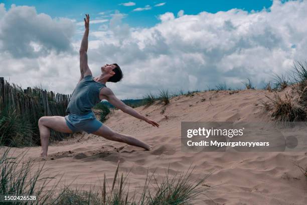 ballet dancer on a beach - beach sand stock pictures, royalty-free photos & images