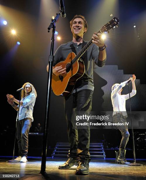 DeAndre Brackensick, Phillip Phillips, and Colton Dixon perform during the American Idol Live! tour at the Bridgestone Arena on August 12, 2012 in...