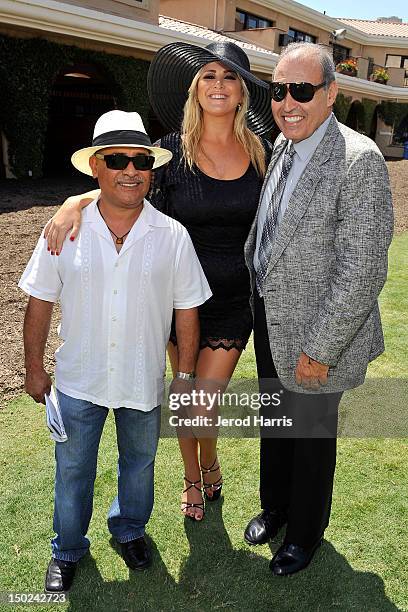 Trainer Walther Solis, Playboy TV personality Josie Goldberg and Paul Ryan attend the Del Mar Thoroughbred Club on August 12, 2012 in Del Mar,...